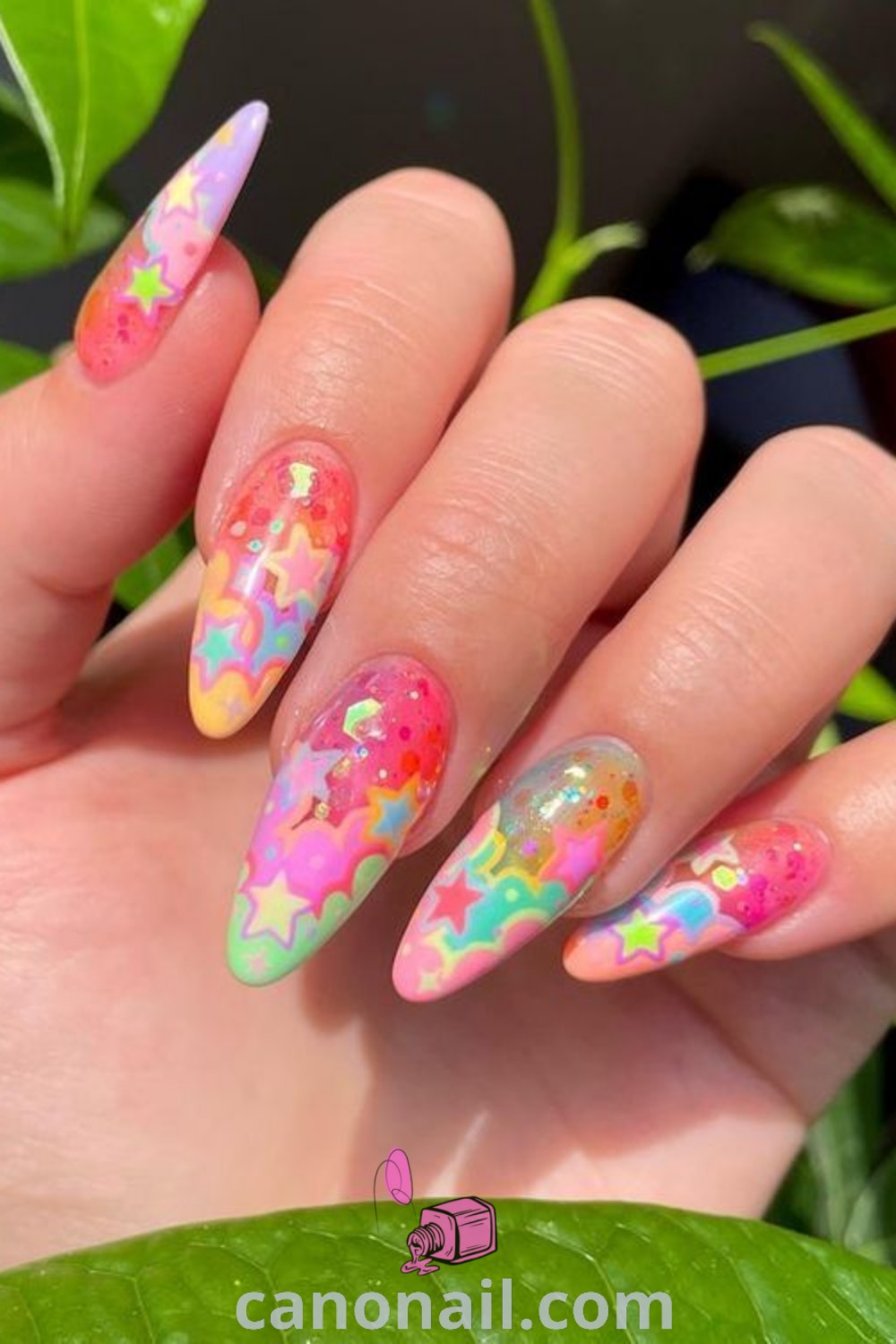 Spring nails on almond-shaped nails featuring pastel colors, rainbow designs, and cute nail art ideas. Ideal for a trendy manicure that captures the essence of spring. Discover more stunning nail looks at canonail.com.