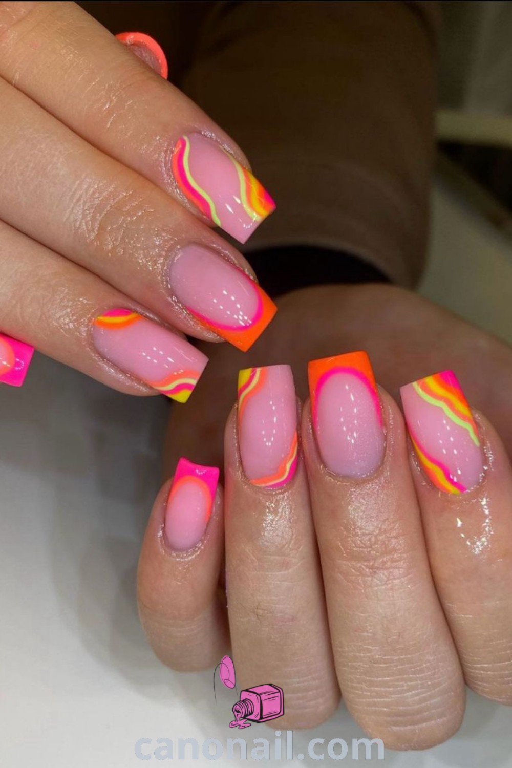 Spring nails designed on square nails featuring daisy patterns and vibrant colors, showcasing short nail styles and gel spring nails. A stunning and elegant nail art idea for the season. Discover more nail inspiration at canonail.com.