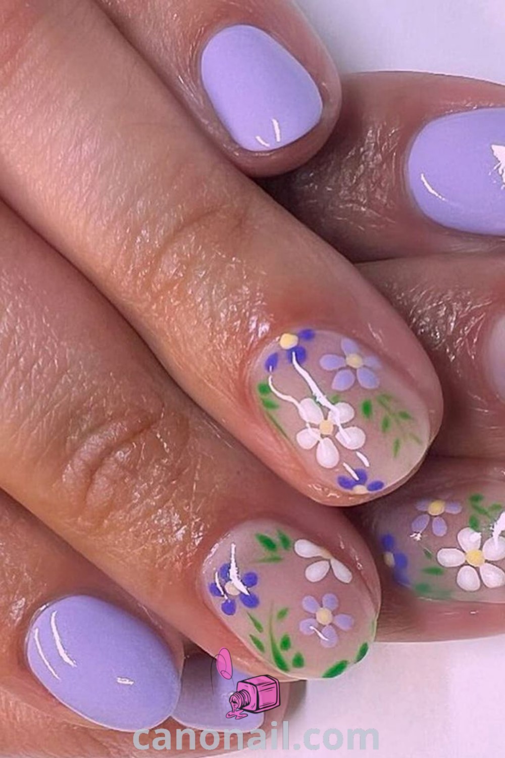 Spring nails featuring square-shaped daisy designs and floral elements, ideal for a trendy manicure. Beautiful nails with gel finishes and short nail sets, perfect for seasonal inspiration. Explore more nail ideas at canonail.com.