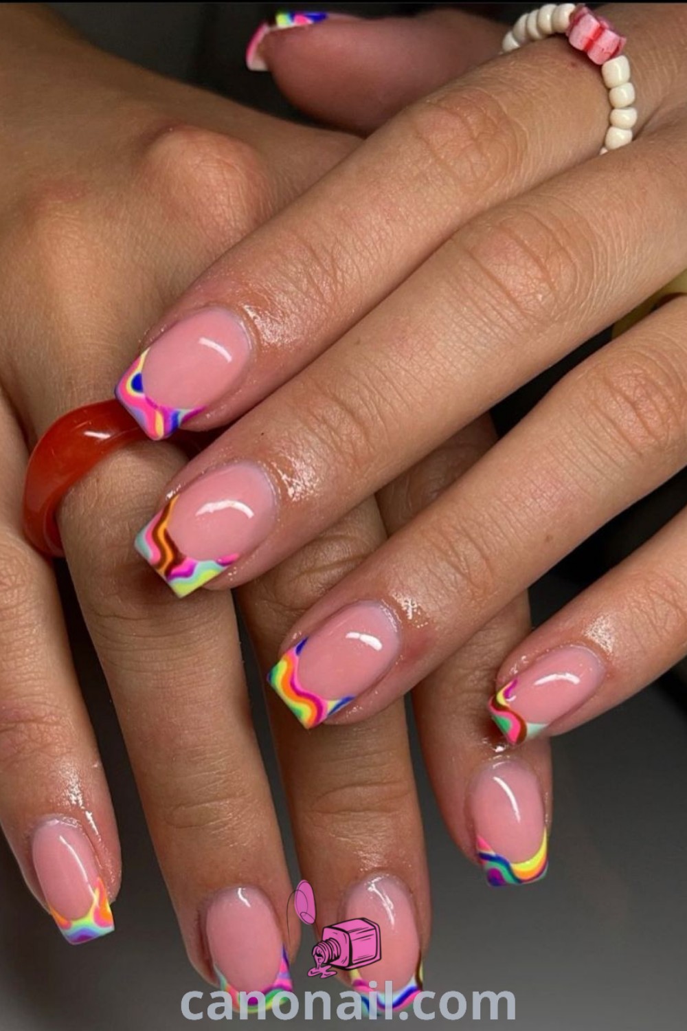Spring nails on square-shaped nails featuring colorful tip designs, classy nail art, retro styles, and Sns nail colors. A beautiful, trendy manicure ideal for spring. Discover more amazing nail ideas at canonail.com.
