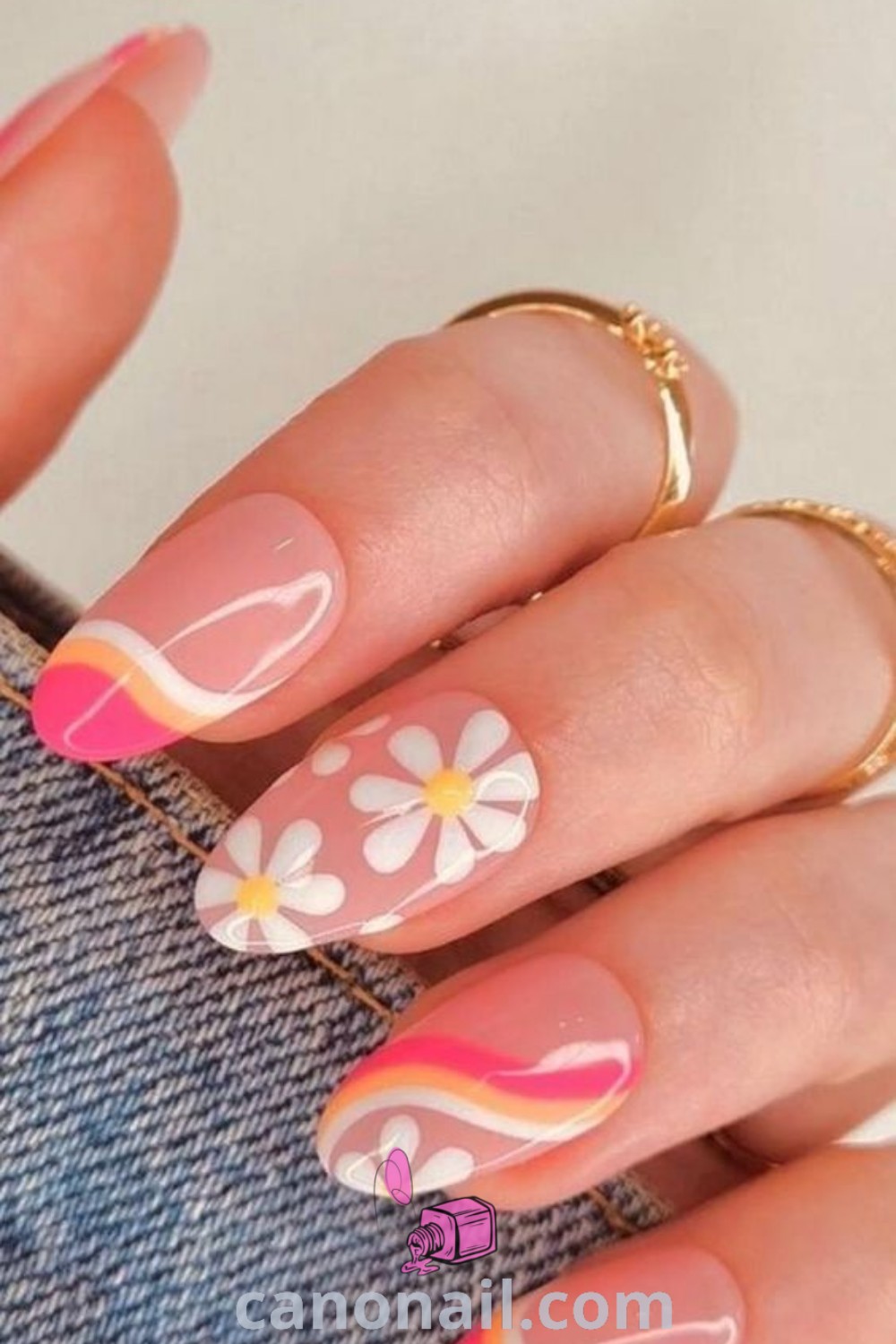 Spring nails featuring cute almond designs with colorful cartoon flowers, fruity motifs, and vibrant yellow and pink themes. Perfect for vacations and seasonal celebrations. Discover beautiful nail inspiration at canonail.com.