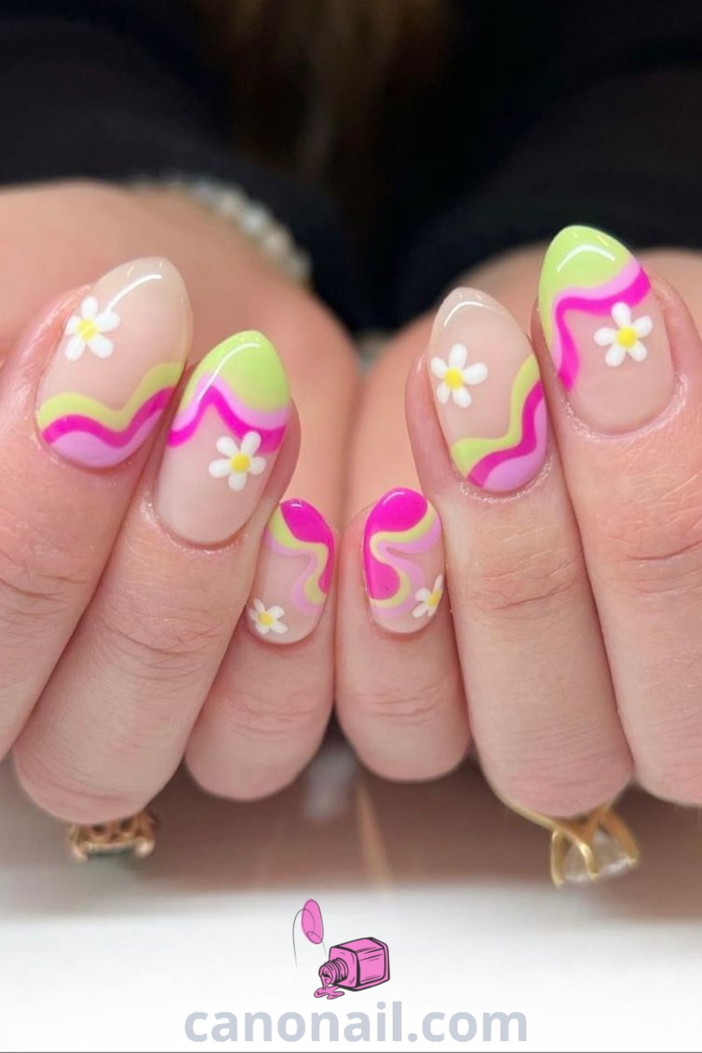 Fun spring nails on almond nails with pastel green shades, acrylic designs, Easter themes, and vibrant nail art. A trendy and playful manicure perfect for the season. Discover more nail inspiration at canonail.com.
