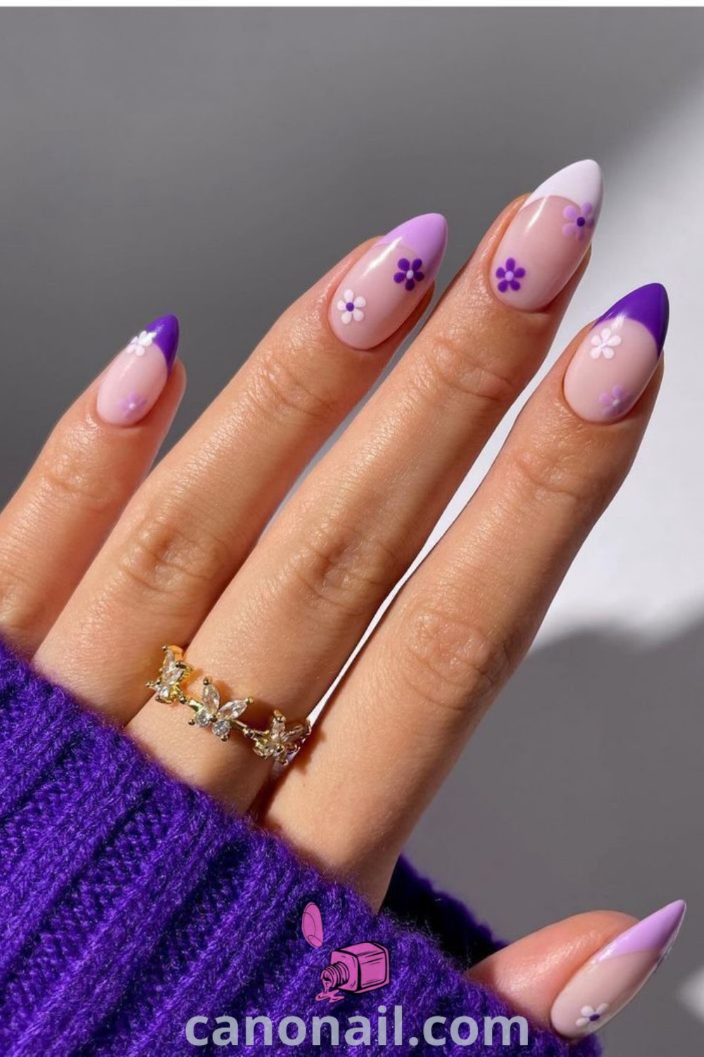 Spring nails on almond-shaped nails featuring lilac and lavender hues, elegant purple nail art, and cute spring designs. A trendy manicure with stunning nail looks for the season. Find more nail inspiration at canonail.com.
