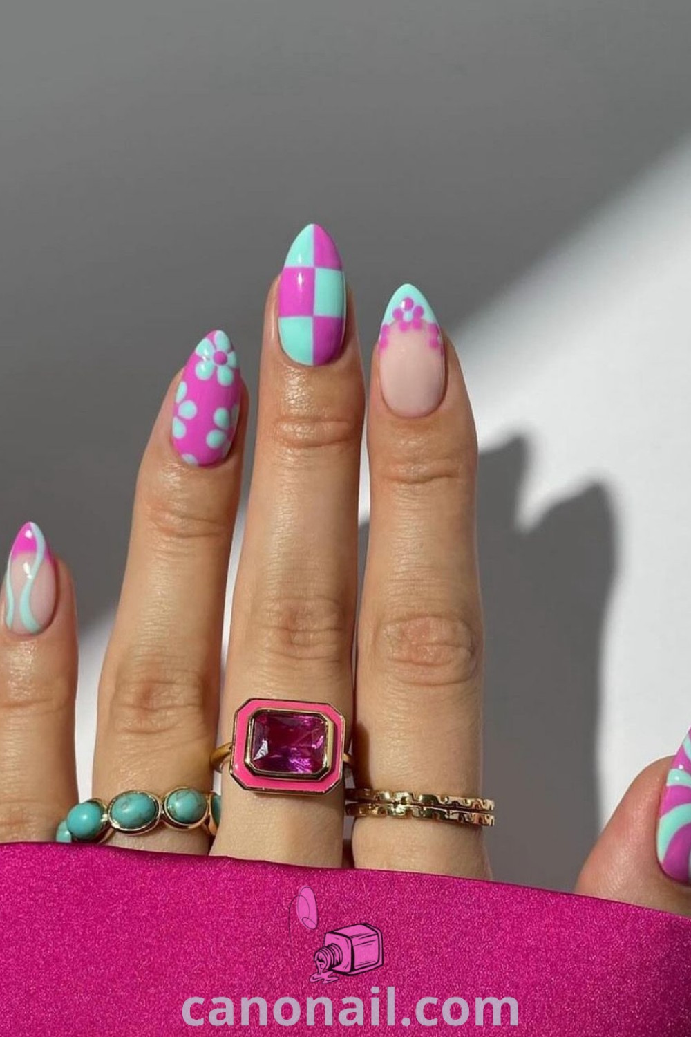 Spring nails with colorful and vibrant designs on almond-shaped nails, showcasing cute gel nail ideas perfect for the season. Explore stunning nail looks and modern nail designs at canonail.com.