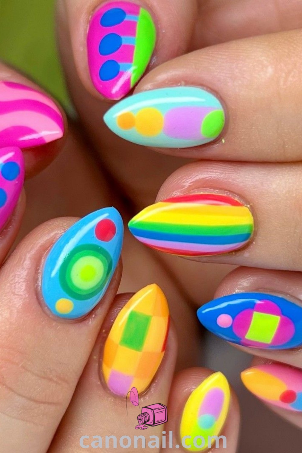 Spring nails featuring colorful nail designs and cute nail art on almond-shaped nails. Perfect for birthdays and celebrations, showcasing sassy nail styles and trendy manicures. Discover more nail ideas at canonail.com.
