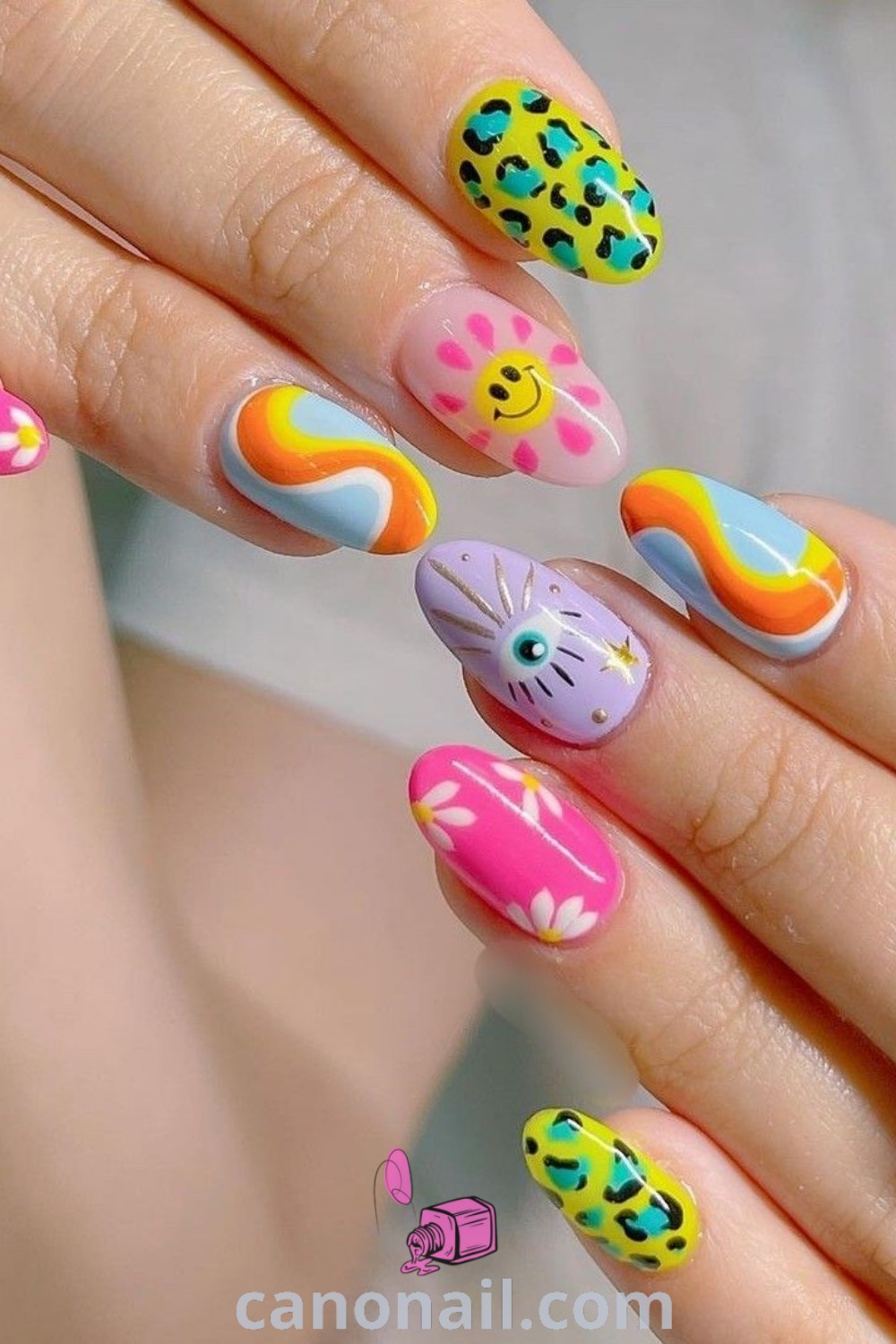 Spring nails featuring almond-shaped designs in the Barbiecore aesthetic, showcasing cute gel nails, Korean nail art, and colorful patterns. Ideal for those seeking trendy manicure inspiration. Discover more nail ideas at canonail.com.