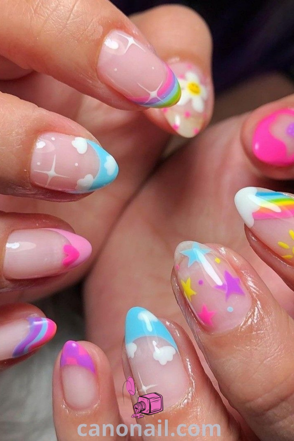 Spring nails featuring pastel rainbow designs on almond-shaped nails, showcasing beautiful nail art and trendy manicure styles. Bright and elegant, these rainbow nails offer modern nail inspiration. Discover more stunning nail ideas at canonail.com.
