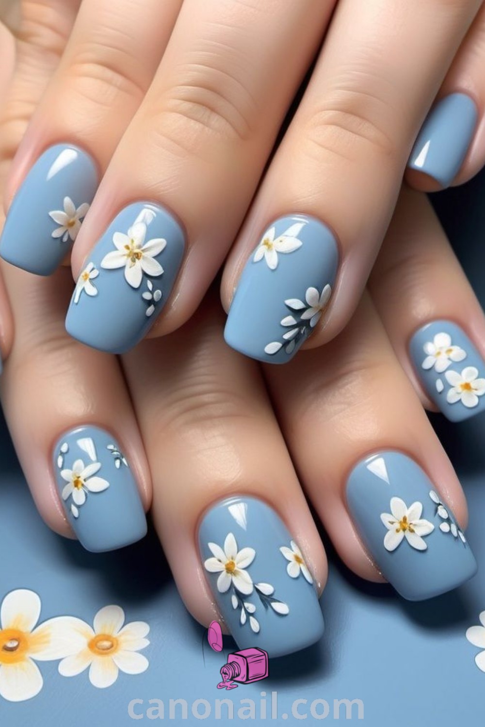 Spring nails featuring square daisy designs and floral nail ideas on short square nails. Bright pastel colors create stunning nail looks that embody the essence of spring. Explore more elegant nail art inspiration at canonail.com.