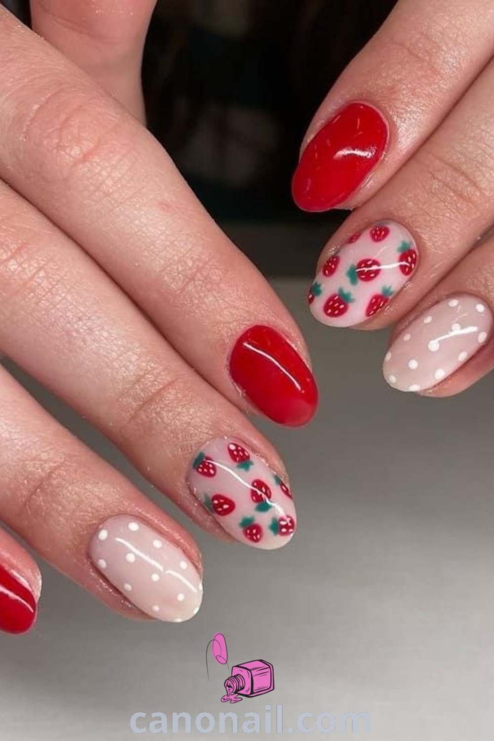 Spring nails featuring almond-shaped designs with strawberry nail art, easy 4th of July themes, fruit motifs, and stunning nail ideas. A modern and elegant manicure perfect for the season