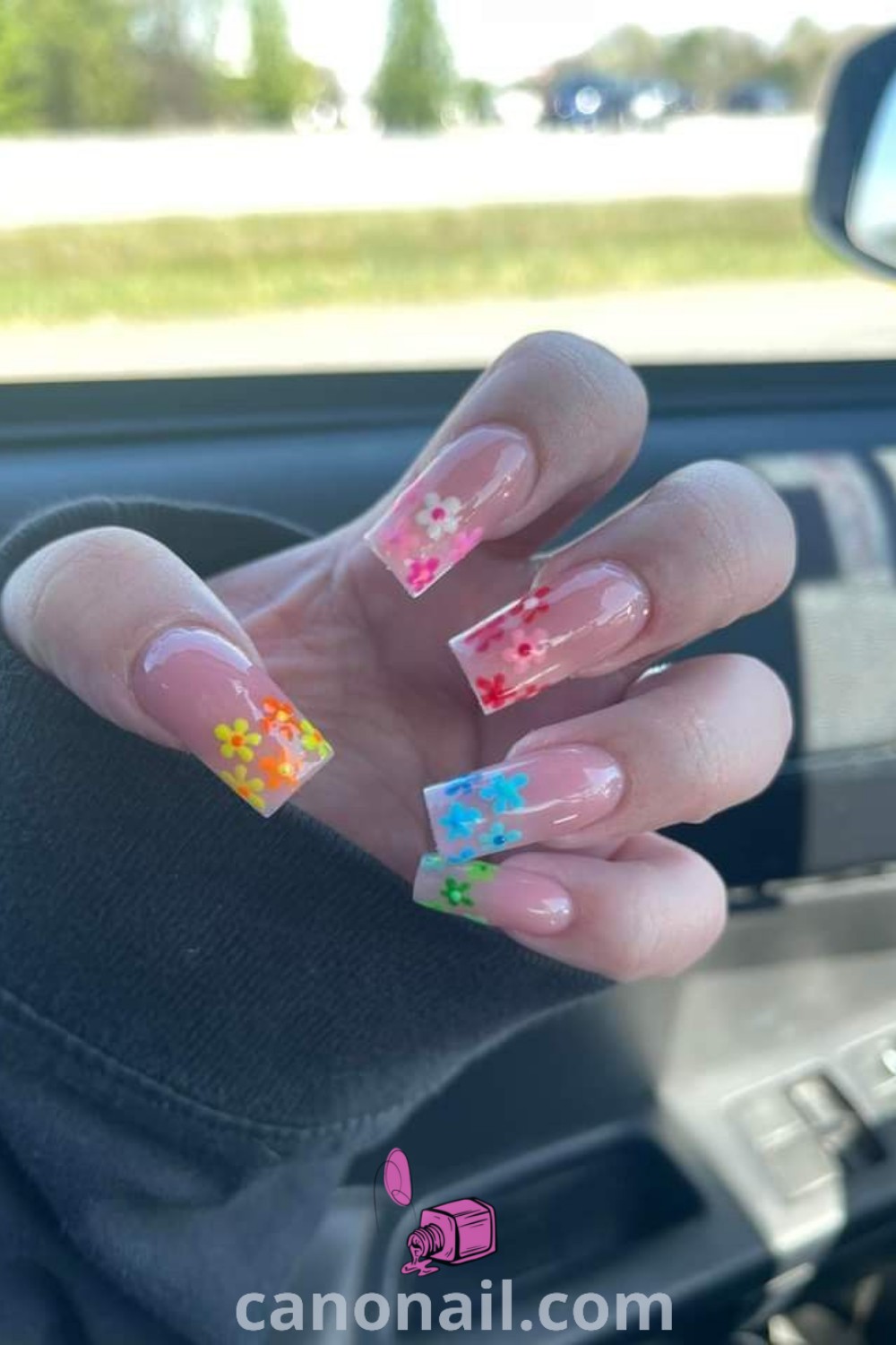 Spring nails on square acrylic designs featuring colorful and girly patterns, simple and French tip acrylic nails. A modern and elegant manicure ideal for the spring season. Discover more stunning nail looks at canonail.com.