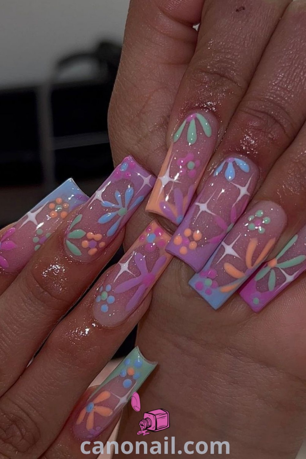 Spring nails on square-shaped nails featuring girly acrylic designs, drip nail art, and cute acrylic nail looks. A perfect blend of modern nail designs for the season. Explore nail inspiration at canonail.com.