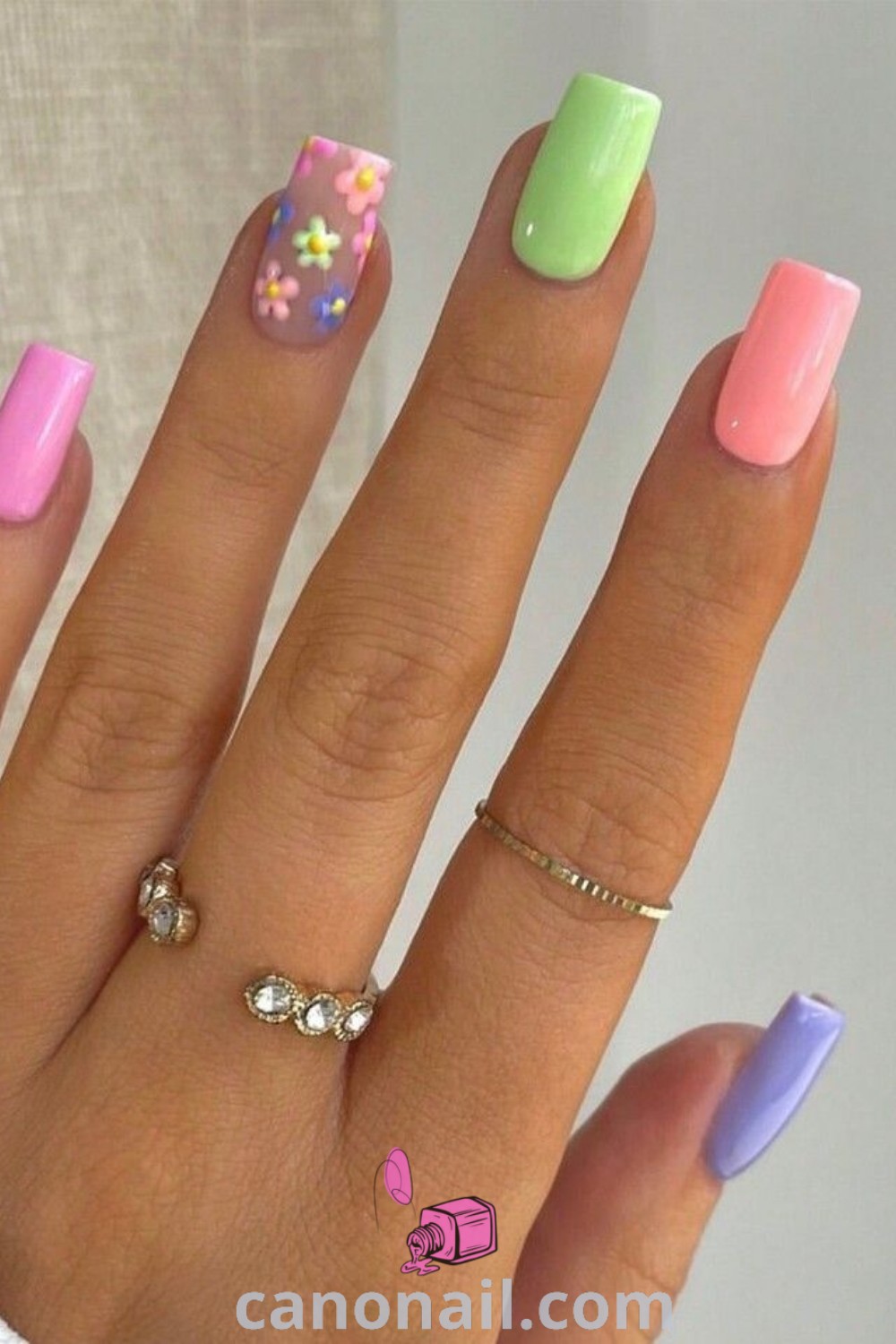 Spring nails featuring square nail designs with floral patterns, bright colors, and cute summer aesthetics. Trendy manicure ideas for square nails that embody the essence of spring. Discover more beautiful nail inspiration at canonail.com.