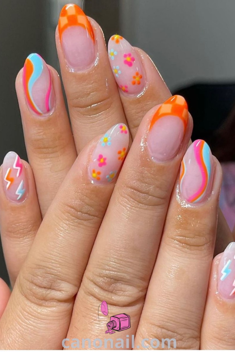 Spring nails in almond shapes featuring fun gel designs inspired by summer lake aesthetics, colorful patterns, and vibrant hues. A trendy and beautiful nail art perfect for the season. Discover more at canonail.com.