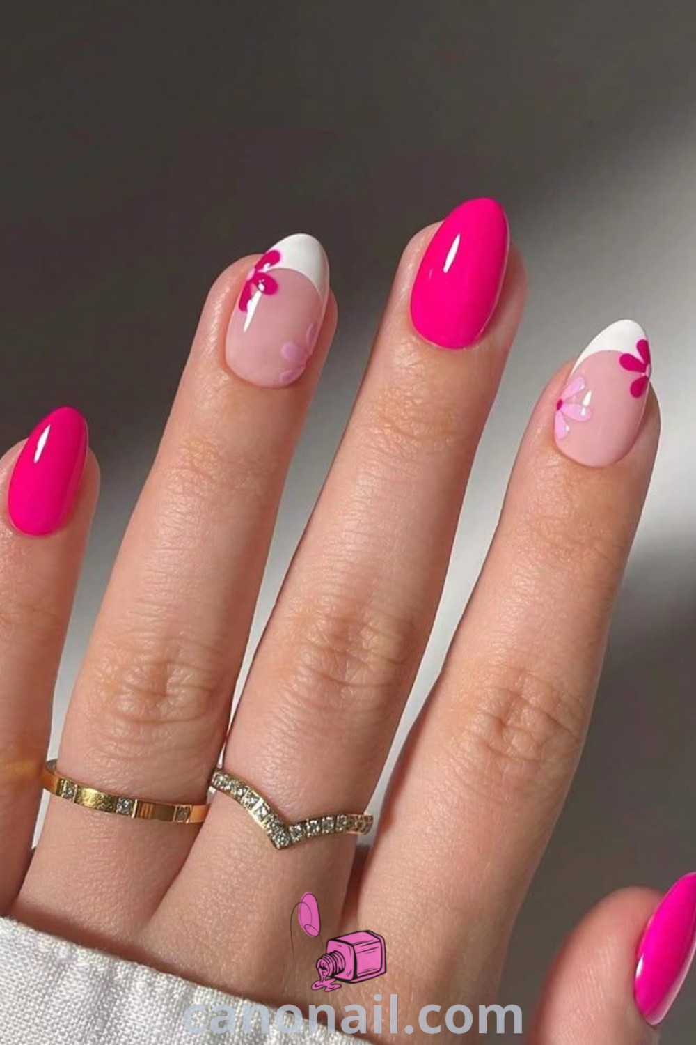 Spring nails featuring almond-shaped designs with French tips and bold nail art, perfect for welcoming the season. Explore trendy manicure ideas for beautiful nails at canonail.com.