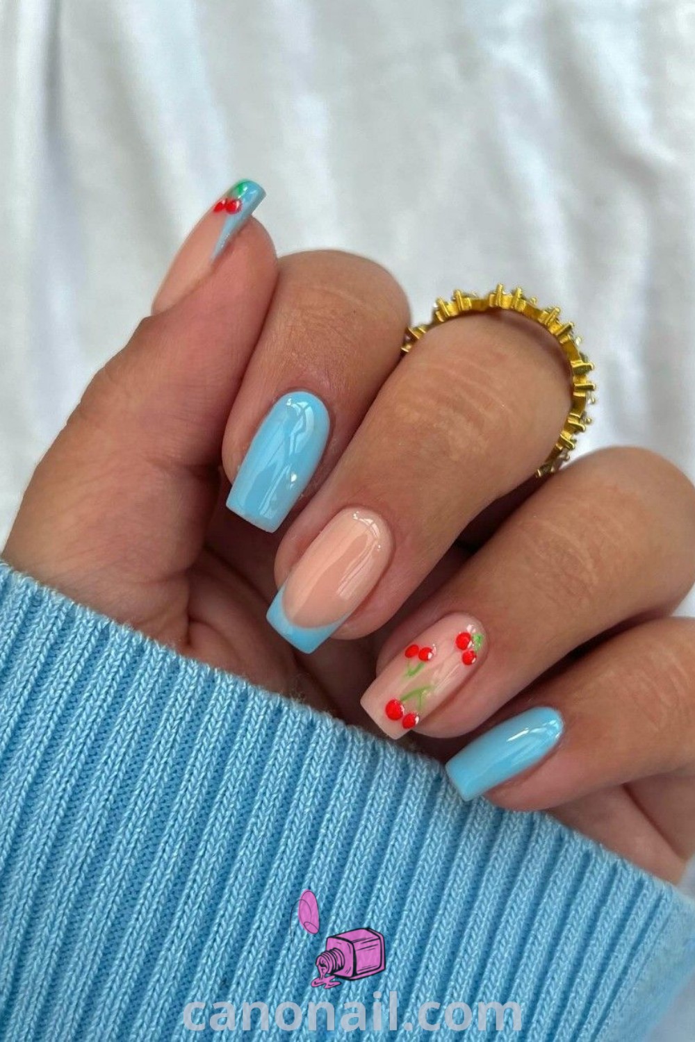 Spring nails designed in a square shape, featuring daisy patterns and vibrant colors. A beautiful mix of floral nail ideas ideal for the season, offering trendy manicures and stunning nail looks. Discover more nail inspiration at canonail.com.