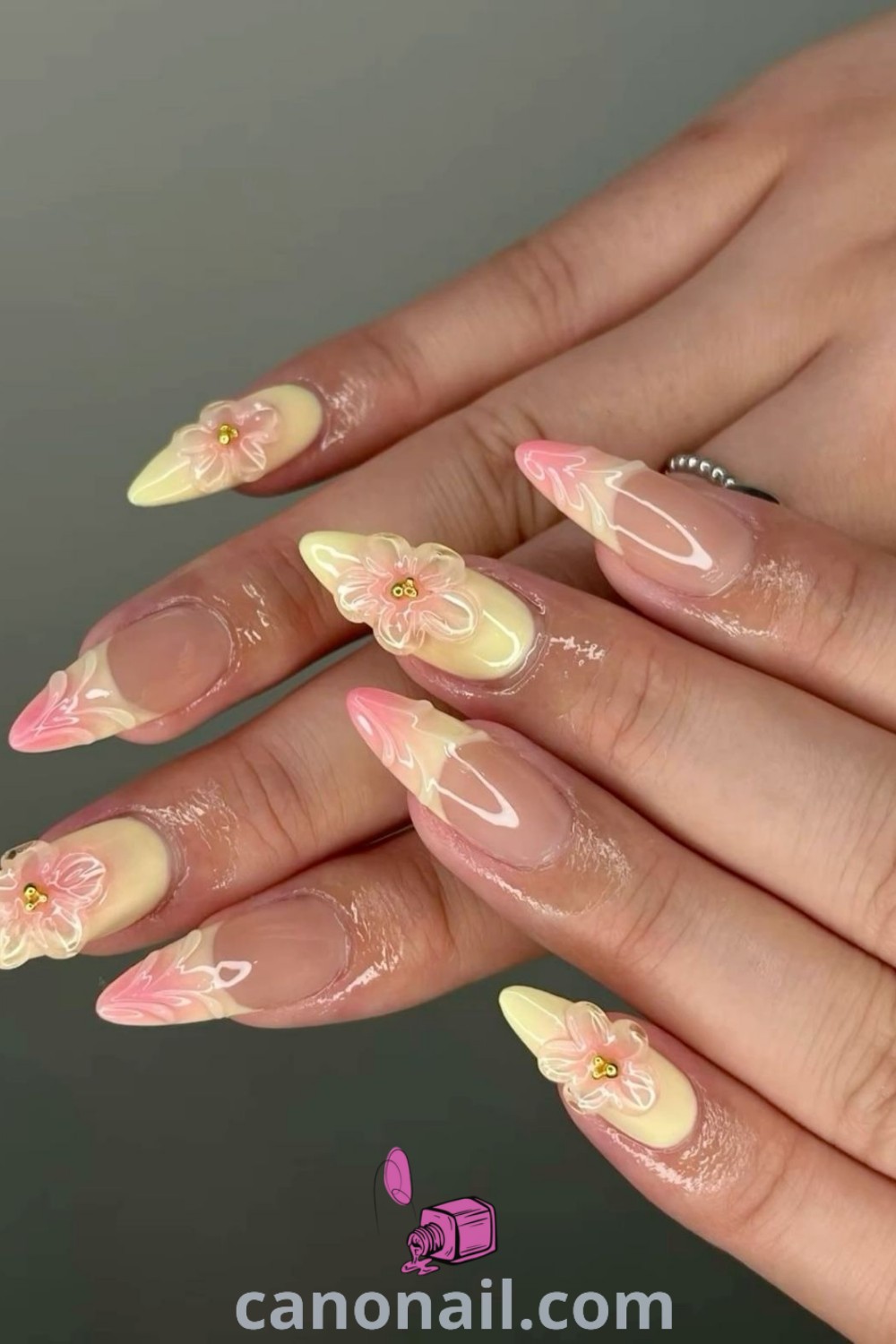 Spring nails with almond shape featuring jelly flower and sculpted flower designs, vibrant hibiscus accents, and a fresh beach-inspired look. Discover trendy manicure ideas and elegant nail art inspiration at canonail.com.