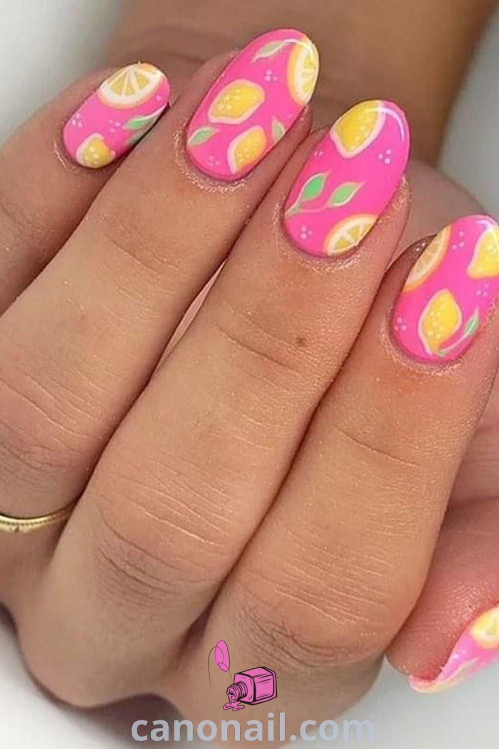 Spring nails featuring almond-shaped designs with colorful fruit art, including pink grapefruit and strawberry lemonade. A vibrant and modern nail design perfect for spring. Discover more nail ideas at canonail.com.