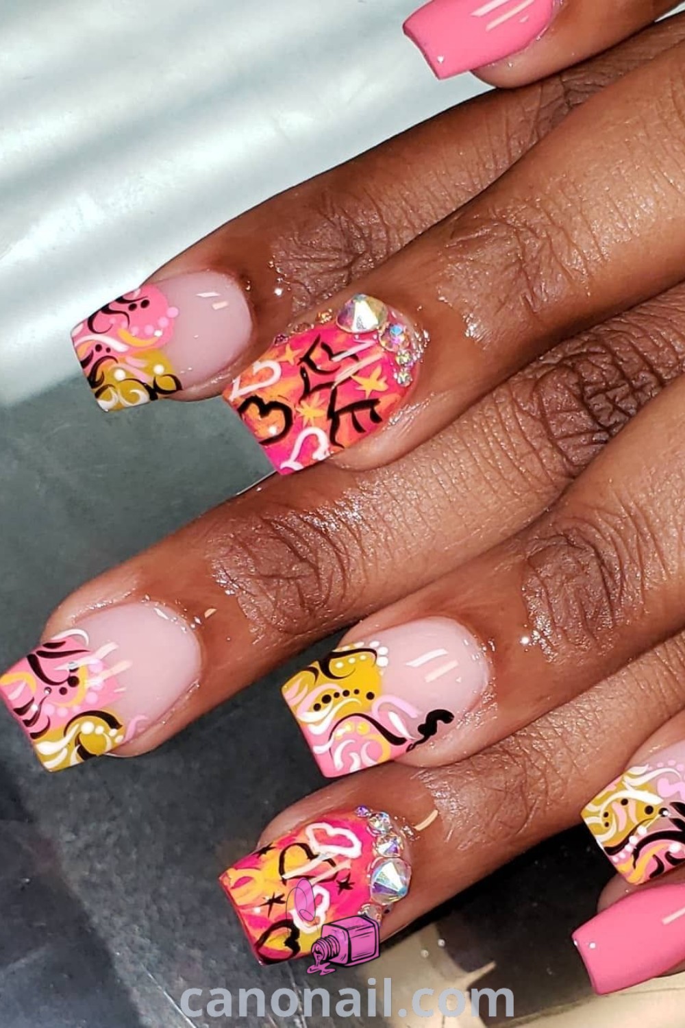 Spring nails showcasing square-shaped daisy designs with vibrant colors and floral patterns, perfect for a chic and stylish look. Discover more nail ideas and designs at canonail.com.