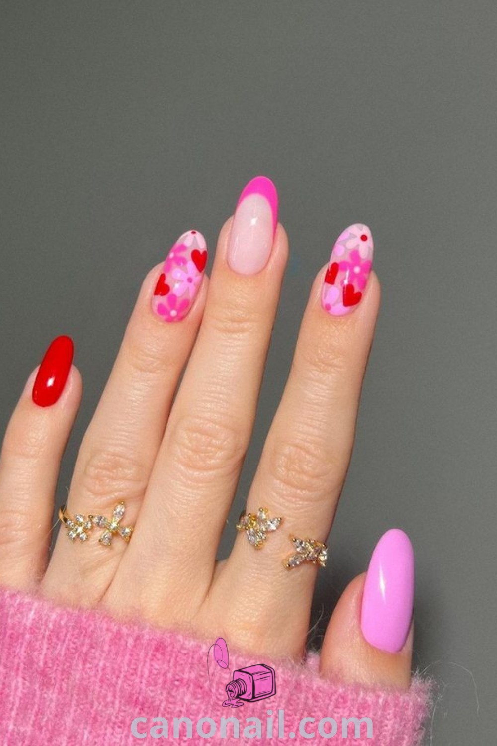 Spring nails on almond-shaped nails featuring vibrant pink chrome, confetti designs, and romantic February vibes. This beautiful nail art offers stunning nail ideas and trendy manicures for the season. Discover more at canonail.com.
