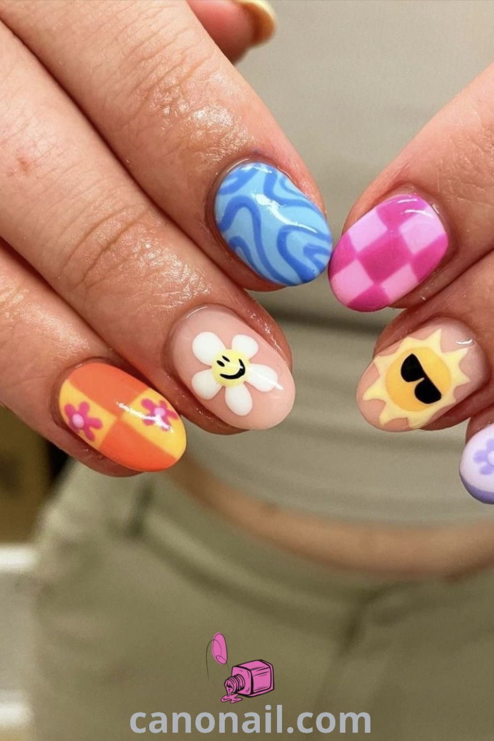 Spring nails featuring short festival nail art on almond-shaped designs, showcasing festive colors and unique styles. Perfect for nail inspiration, explore beautiful nail ideas at canonail.com.